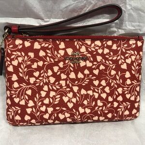 Coach Red and pink wristlet w heart pattern Original hangtag, Gold hardware NWOT